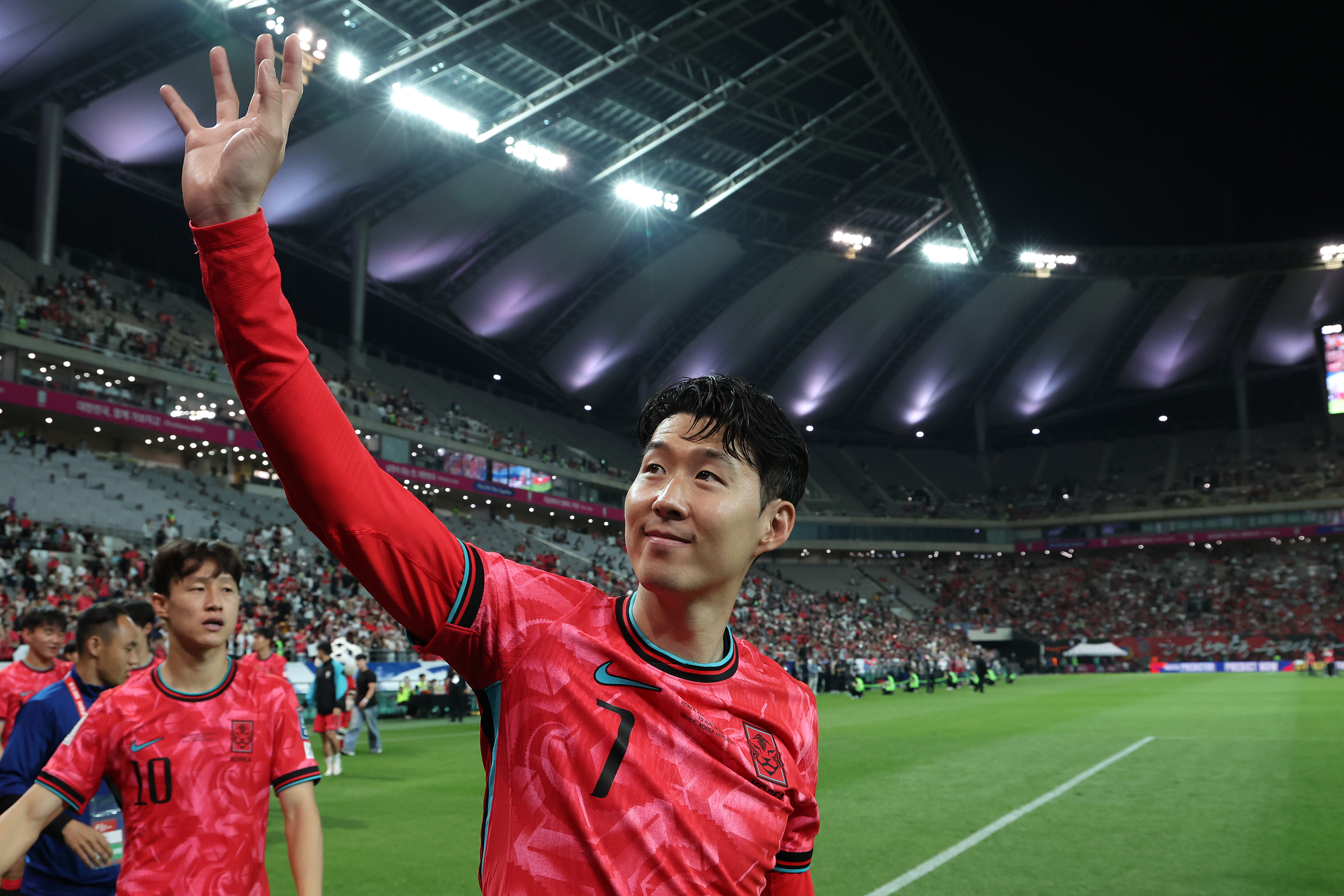 Son Heung-min waves to the crowd whilst on international duty