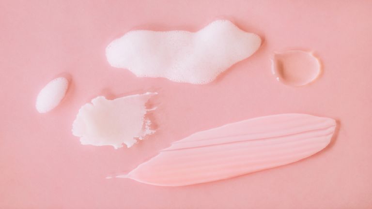Benzoyl peroxide swatches on pink background