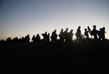 Migrants travel through Mexico.