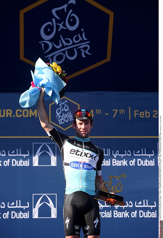 Mark Cavendish (Etixx-QuickStep) raises his podium flowers