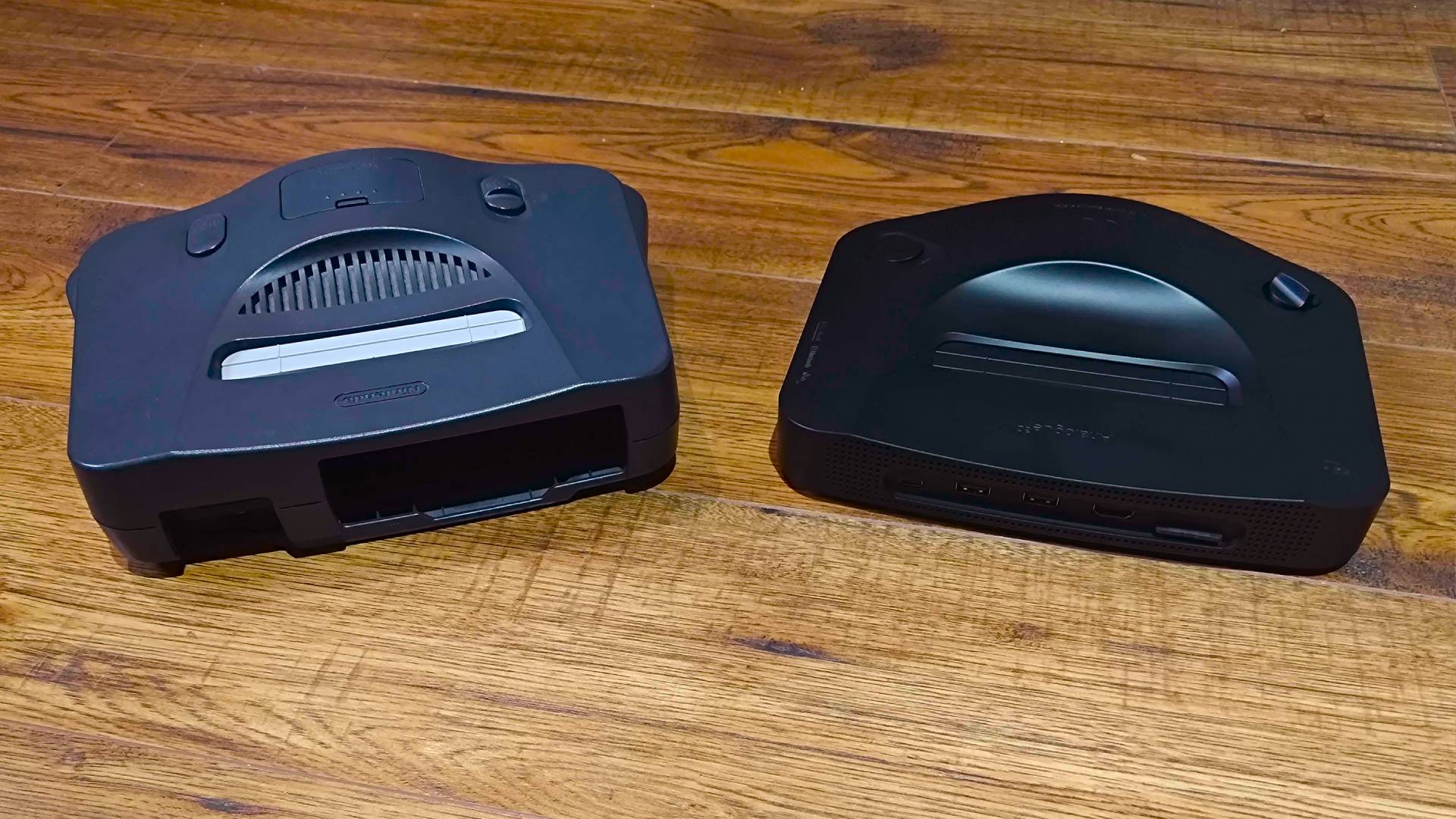 Analogue 3D on right and N64 on left with back facing forwards.