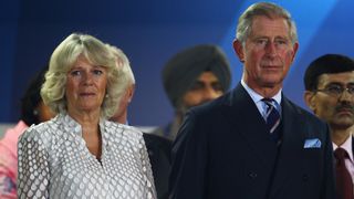 Prince Charles, Prince of Wales and Camilla, Duchess of Cornwall chat during the Opening Ceremony for the Delhi 2010 Commonwealth Games at Jawaharlal Nehru Stadium on October 3, 2010 in Delhi, India.