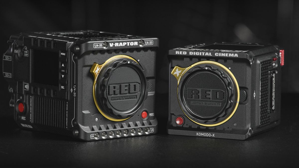 RED V-Raptor and RED Komodo cinema cameras side by side on a black background