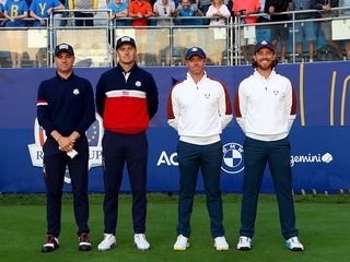 Tommy Fleetwood, Rory McIlroy, Justin Thomas and Jordan Spieth preparing to take on their Foursomes match at the 2023 Ryder Cup in Rome