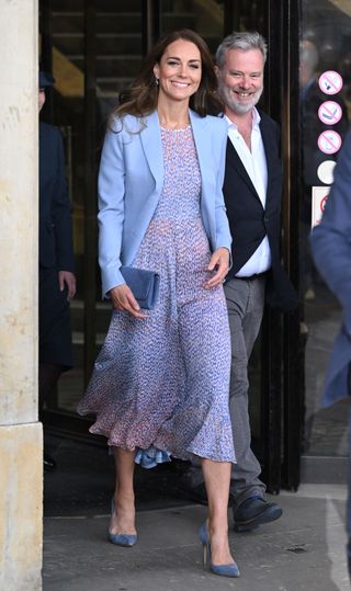 Kate Middleton in a printed dress and powder blue blazer