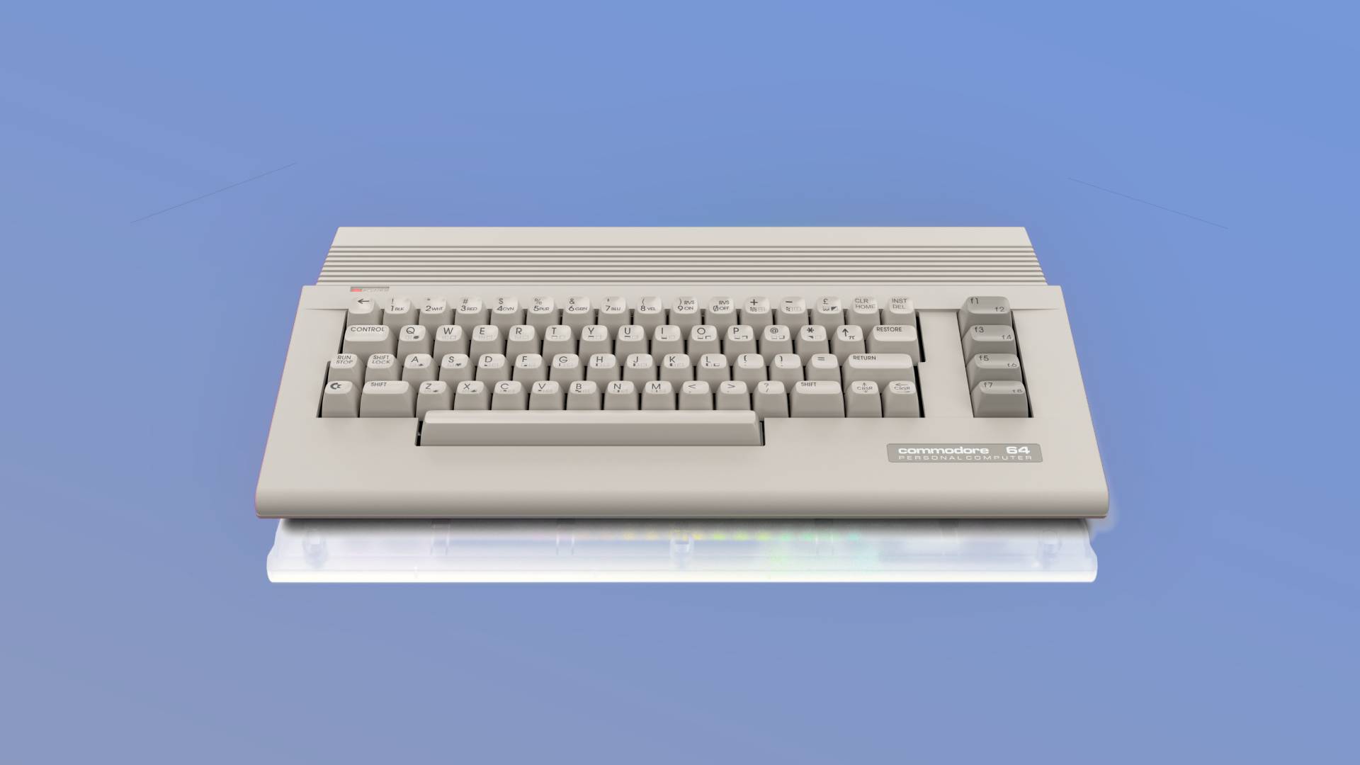 C64C Ultimate Basic Beige edition with blue backdrop.