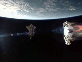 Shuttle Atlantis Bids Farewell to Space Station
