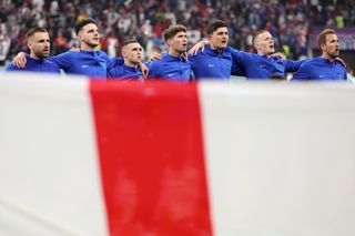 England players sing the national anthem ahead of their World Cup quarter-final against France in Qatar in December 2022.