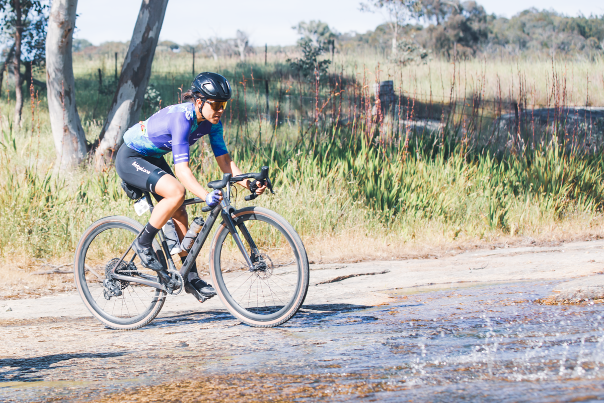 Gina Ricardo (Team BridgeLane) on her way to fourth at the Gravelista round of the UCI Gravel World Series race in Beechworth, 2023