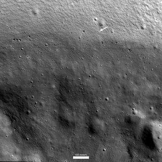 An annotated version of the opening image, the arrow indicates a boulder track. Faint horizontal lines are camera artifacts that will eventually be removed once we have obtained a robust inflight calibration dataset.
