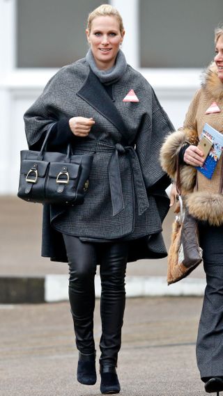 Zara Tindall accompanied by Belinda Keighley (r) attends the Christmas Racing Meet at Ascot Racecourse in 2016