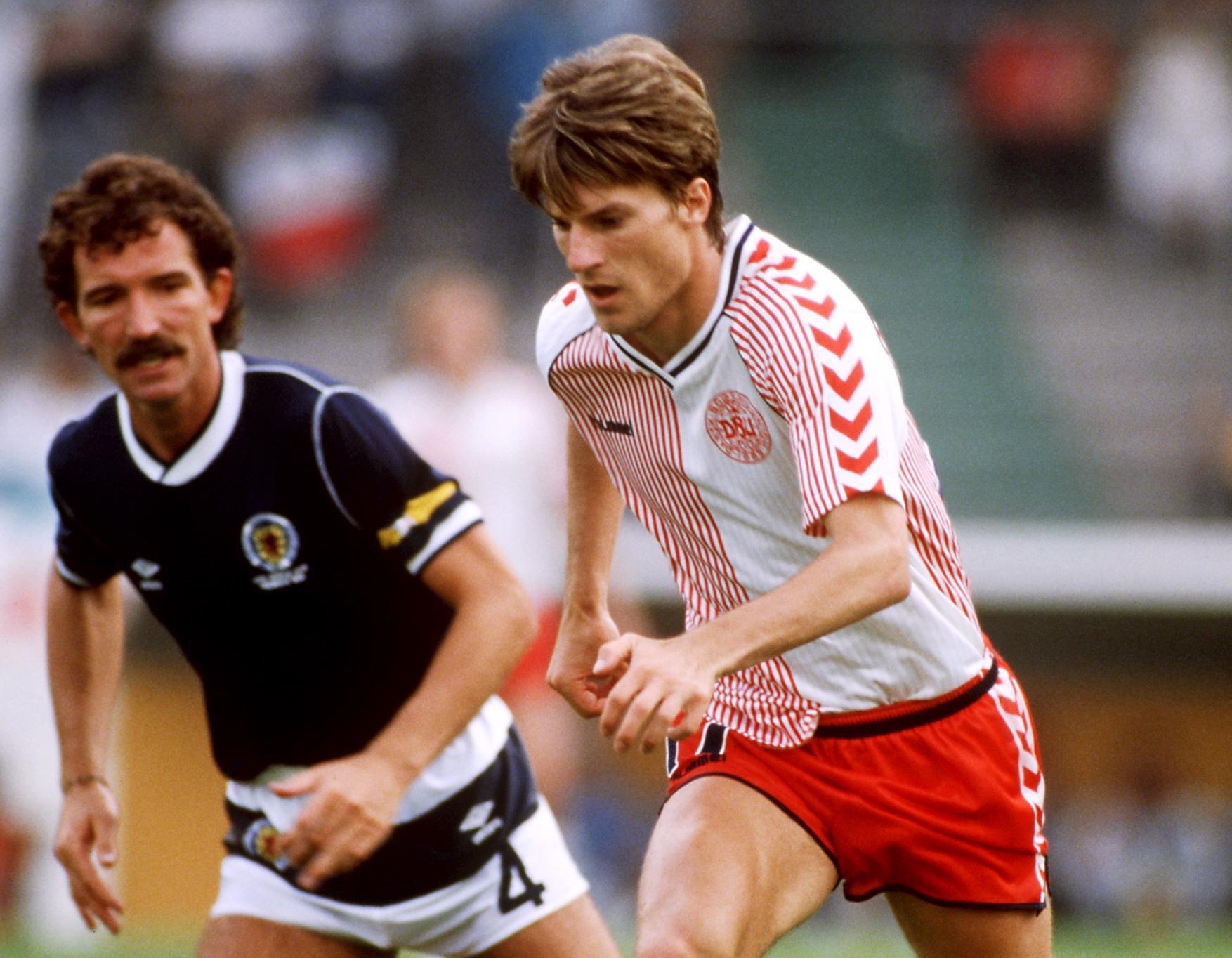 Michael Laudrup playing for Denmark against Scotland at the 1986 World Cup