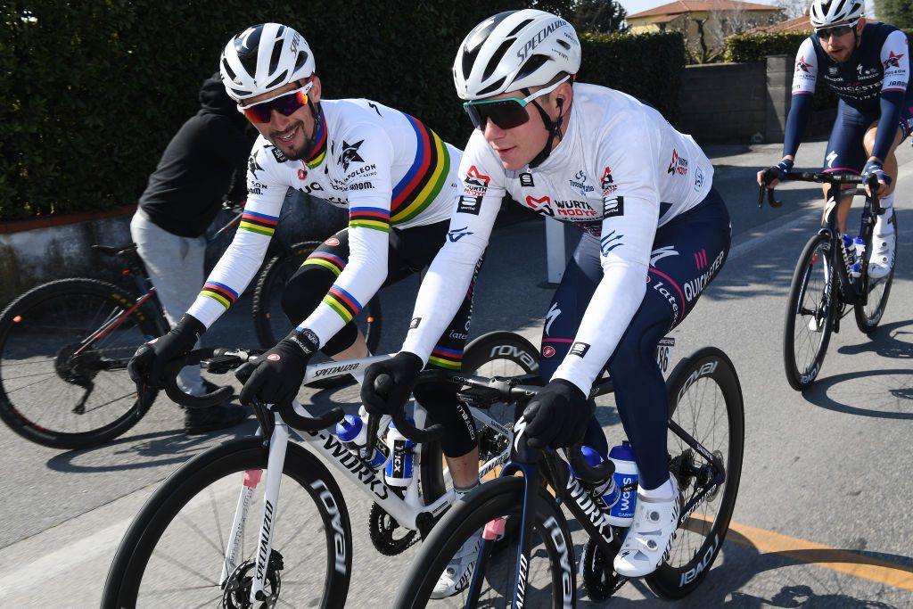 SOVICILLE ITALY MARCH 08 LR Julian Alaphilippe of France and Remco Evenepoel of Belgium and Team QuickStep Alpha Vinyl White Best Young Rider Jersey compete during the 57th TirrenoAdriatico 2022 Stage 2 a 219km stage from Camaiore to Sovicille TirrenoAdriatico WorldTour on March 08 2022 in Sovicille Italy Photo by Tim de WaeleGetty Images