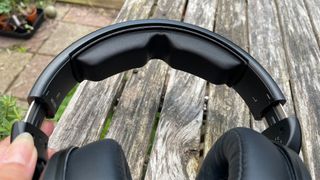 Sennheiser HD 620S headphones held in hand showing headband padding