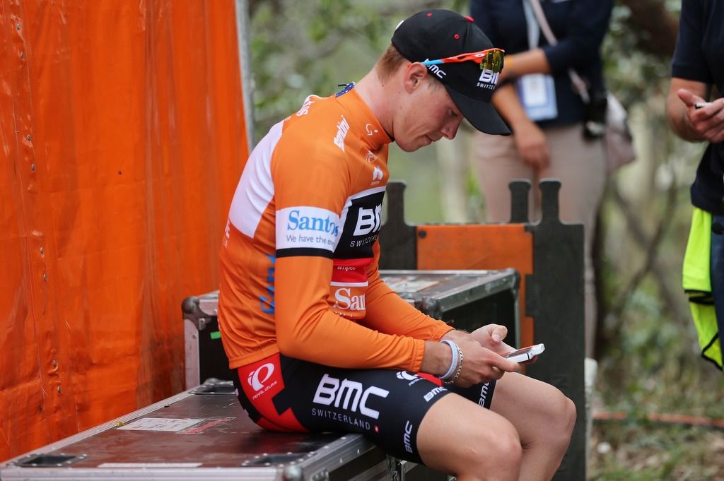 Rohan Dennis has time to check his phone during the 2015 edition of the race which he won