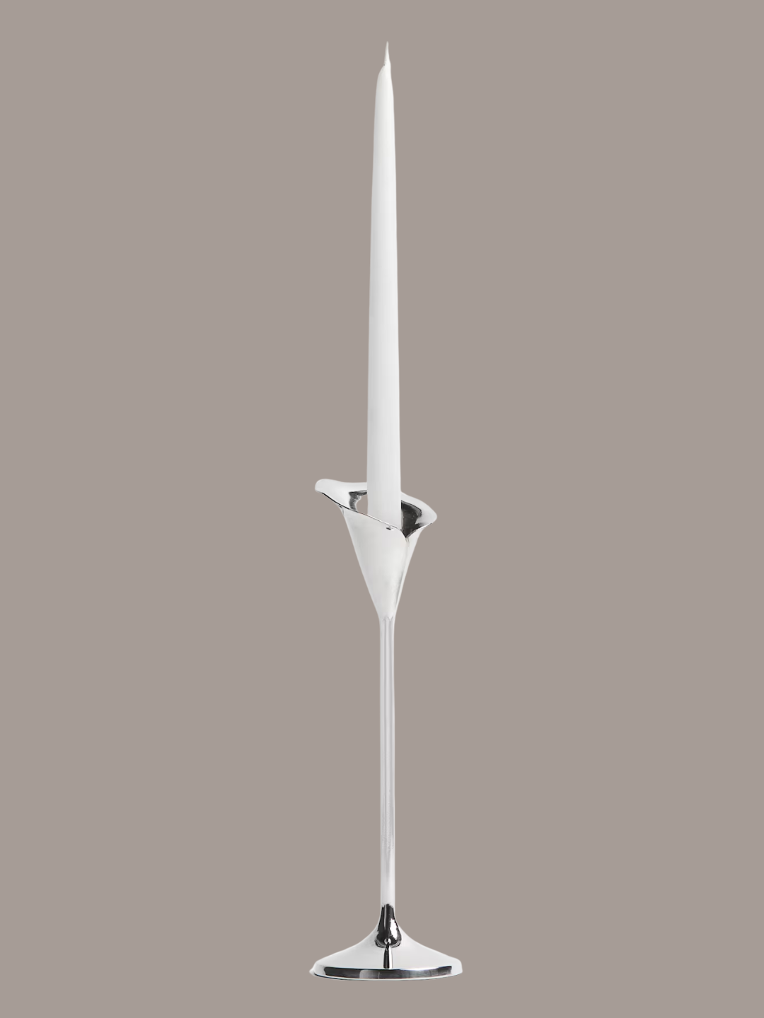 A chrome tall flower-shaped candlestick from H&amp;amp;M