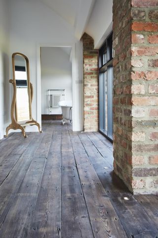 reclaimed wooden floor in a hallway