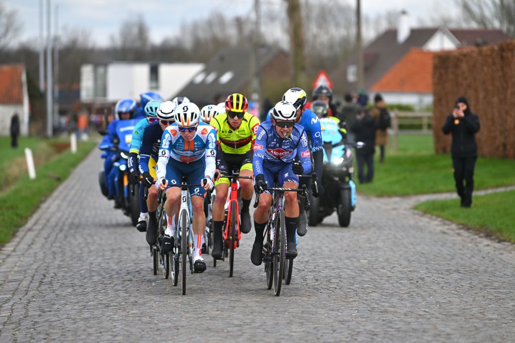 NINOVE BELGIUM FEBRUARY 24 LR Frank Van Den Broek of The Netherlands and Team DSMFirmenich PostNl and Lars Boven of The Netherlands and Team AlpecinDeceuninck compete in the breakaway during the 79th Omloop Het Nieuwsblad 2024 Mens Elite a 2022km one day race from Ghent to Ninove UCIWT on February 24 2024 in Ninove Belgium Photo by Luc ClaessenGetty Images