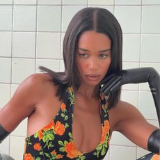 Laura Harrier with a collarbone-length hairstyle.