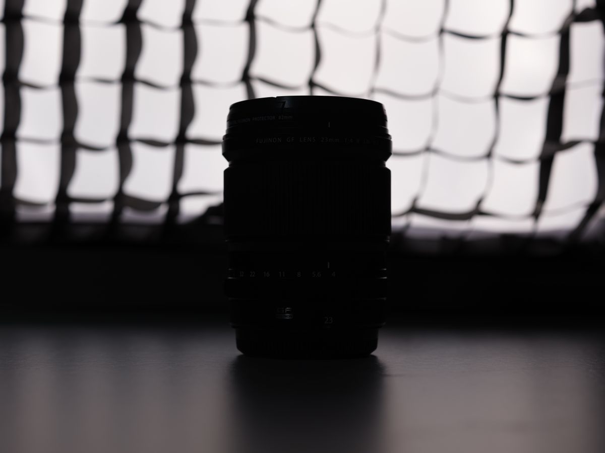 A photo of a Fujifilm lens backlit with a softbox