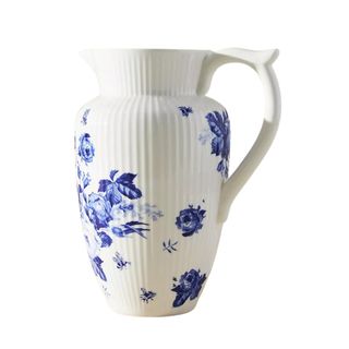 A white and blue floral patterned stoneware jug