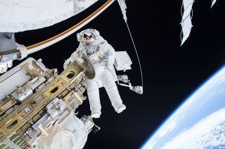 A NASA astronaut works outside the International Space Station. NASA received more than 12,000 applications in March 2020 from people wanting to become astronauts.