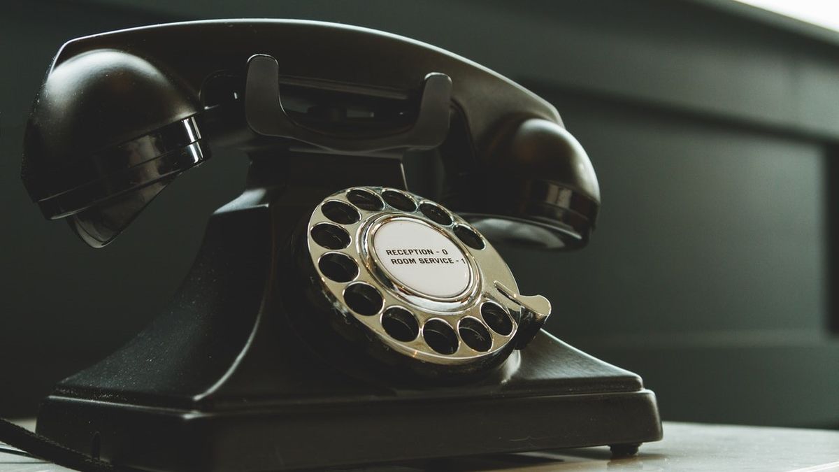 Black rotary telephone