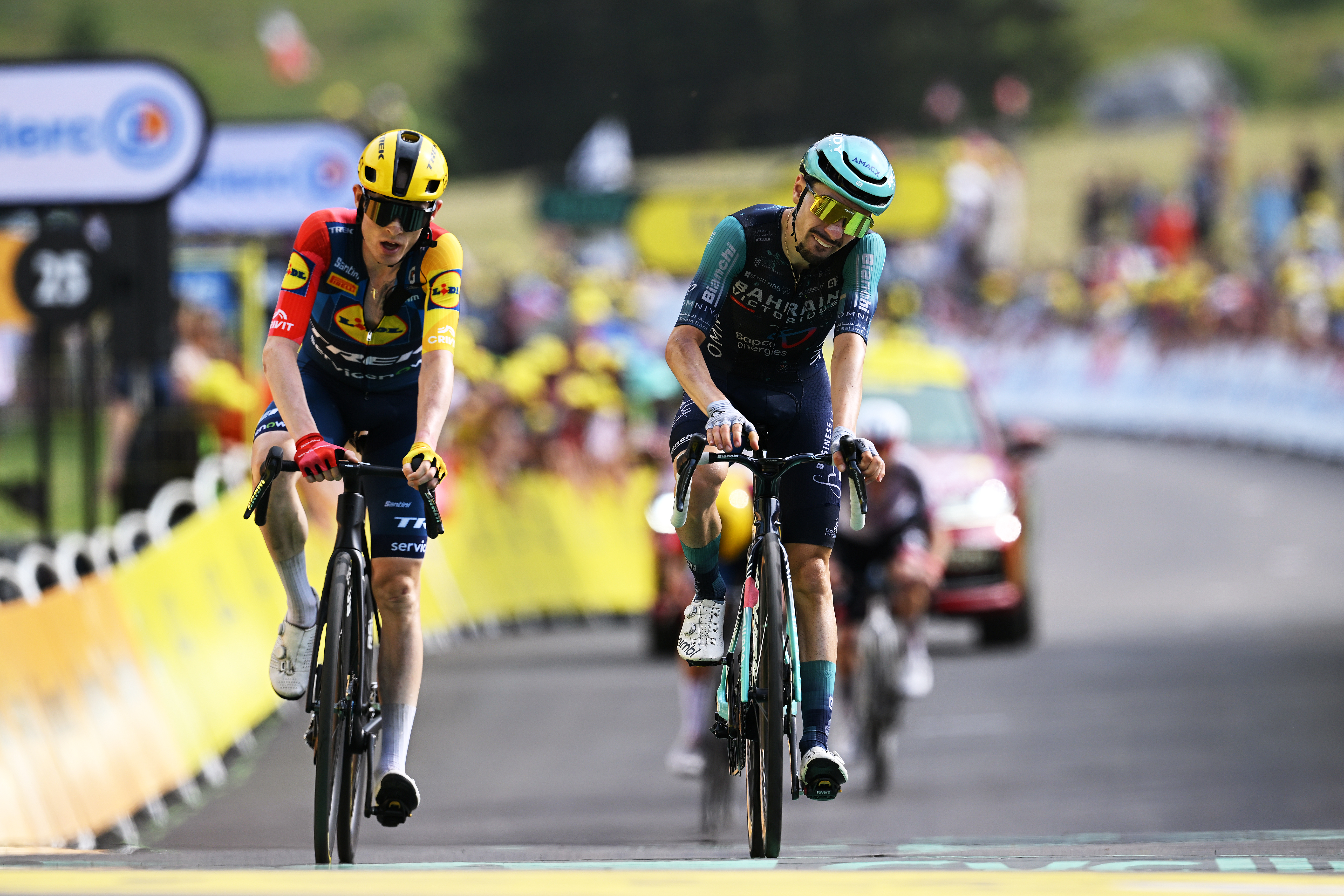 PLATEAU DE SOLAISON, FRANCE - JULY 19: (L-R) Mattias Skjelmose of Denmark and Team Lidl - Trek and Lenny Martinez of France and Team Bahrain - Victorious cross the finish line during the 113th Tour de France 2026, Stage 15 a 183.9km a 155.3km stage from Champagnole to Plateau de Solaison 1501m / #UCIWT / on July 19, 2026 in Plateau de Solaison, France. (Photo by Dario Belingheri/Getty Images)