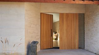 oversized timber pivot front door