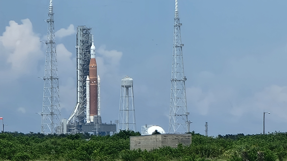 Artemis 1 rocket on launch pad with blue sky