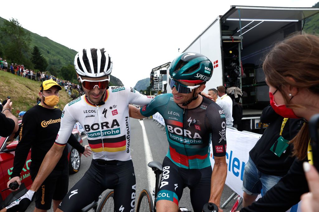 LARUNS FRANCE JULY 05 Stage winner Jai Hindley of Australia and Team BORAHansgrohe R celebrates at finish line with his teammate Emanuel Buchmann of Germany L after the stage five of the 110th Tour de France 2023 a 1627km stage from Pau to Laruns UCIWT on July 05 2023 in Laruns France Photo by Benoit Tessier PoolGetty Images