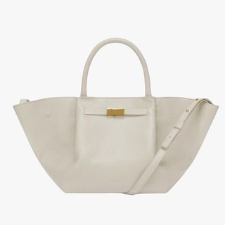 A cutout of a white demellier tote bag