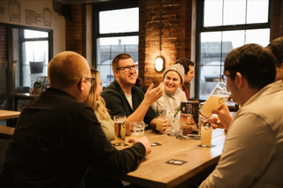 people in a pub having a drink