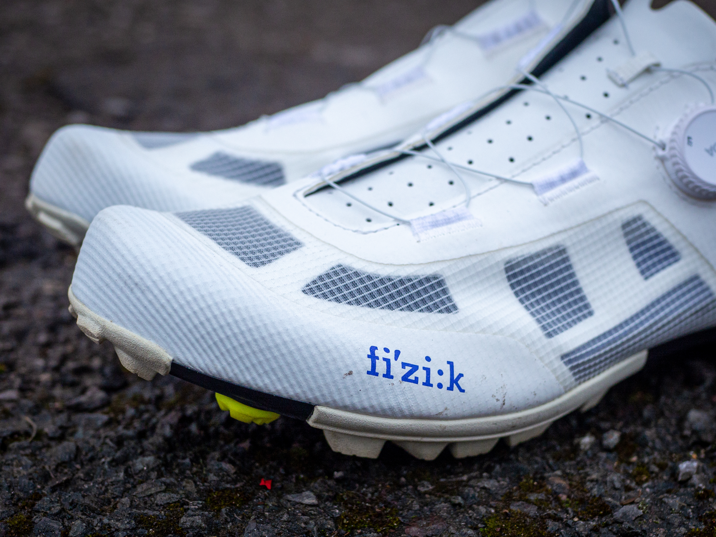 A white pair of Fizik Vento Proxy gravel shoes