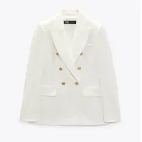 Textured Double Breastes Blazer $85.78 (£69.99) | Zara