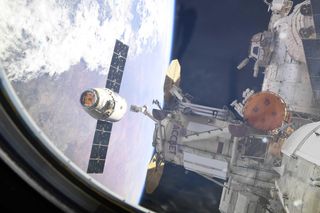 The Dragon capsule was deployed by the Canadarm2, a robotic arm aboard the International Space Station.