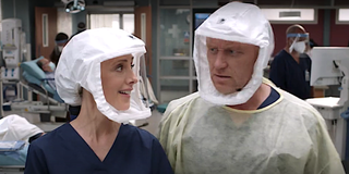 Grey's Anatomy Teddy Altman and Owen Hunt exchange a look in the hospital.