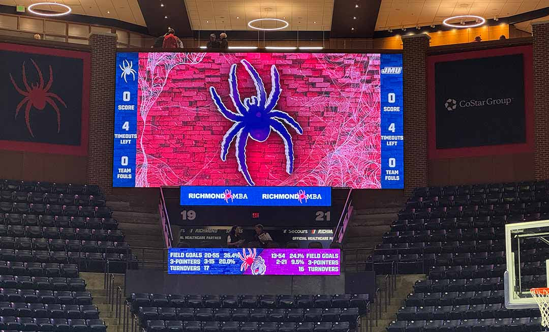 Daktronics LED displays light up University of Richmond college basketball court.