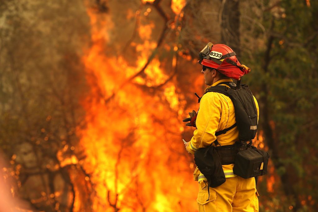 A firefighter battling the Carr Fire.