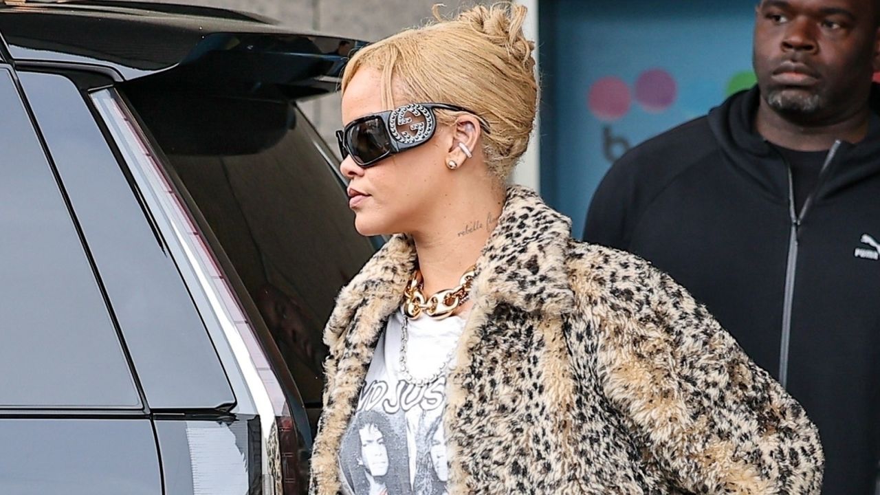 Rihanna spotted in Los Angeles wearing a giant faux fur coat and Gucci sunglasses