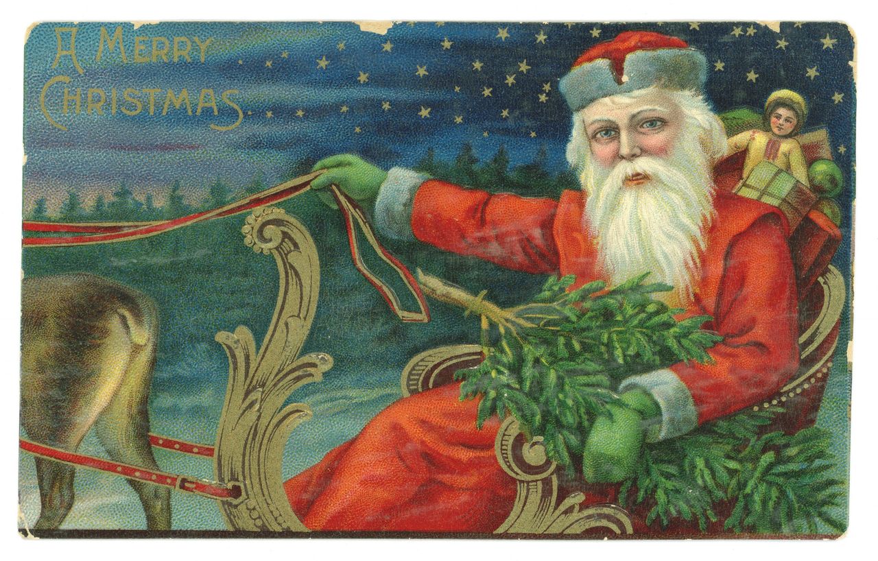 Naughty or nice? Father Christmas depicted in an Edwardian postcard.