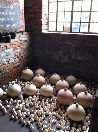 Ukrainian artist Oksana Mas’ ’Post-vs-Proto-Rennaisance’ wooden egg installation inside Venice’s Chiesa di San Fantin