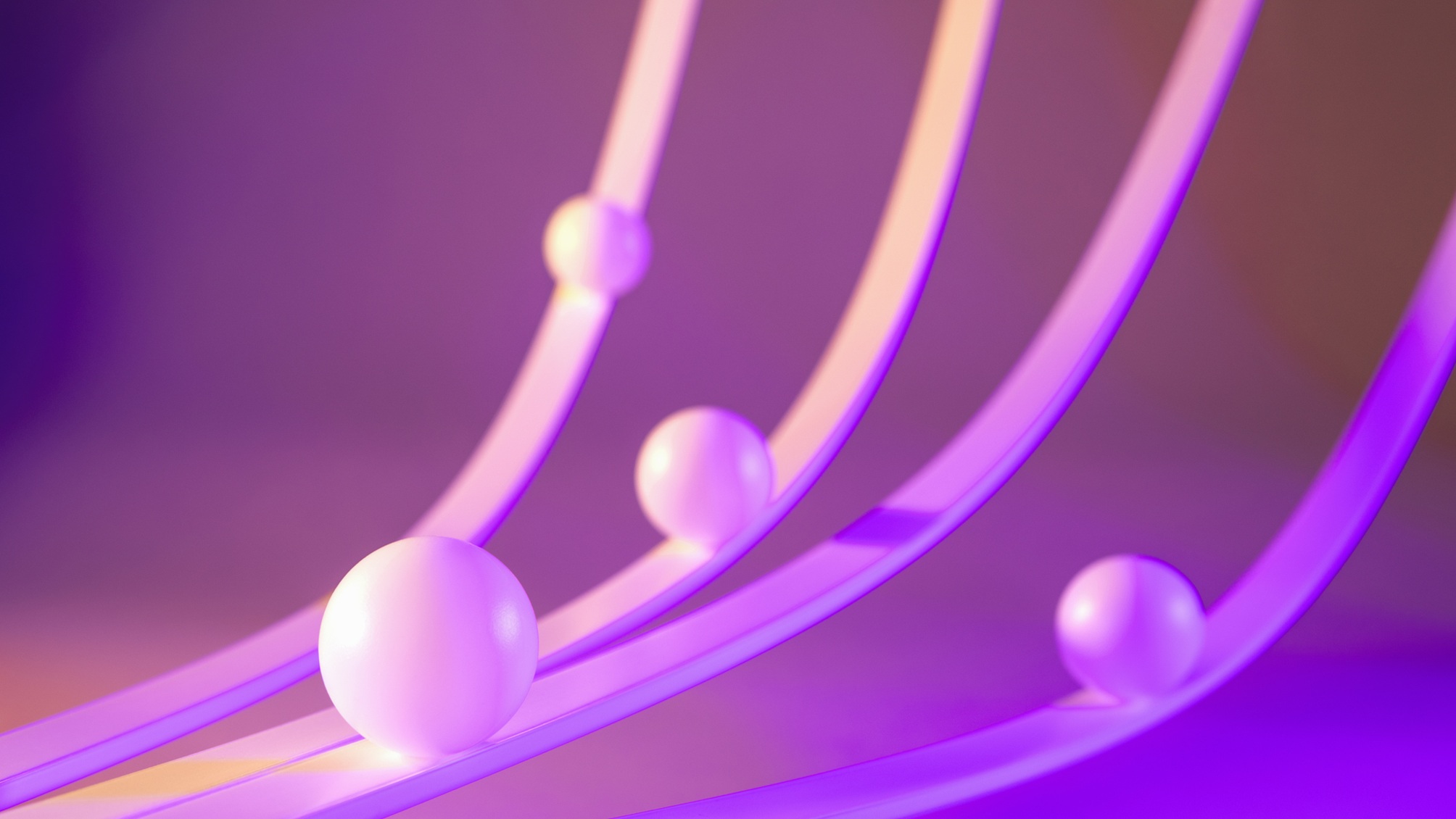 Four white balls riding on thin, sloping rails against a pink and purple background.
