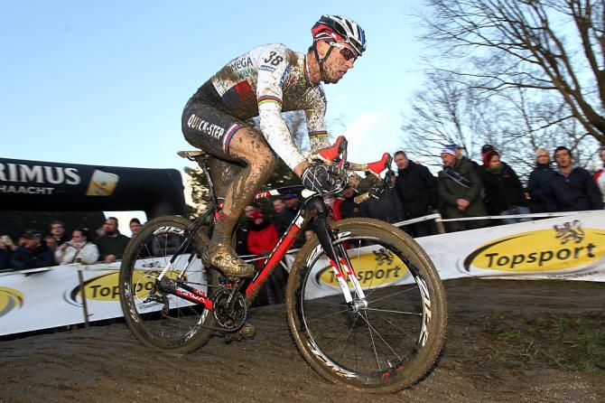 Zdenek Stybar powers through the mud in Baal