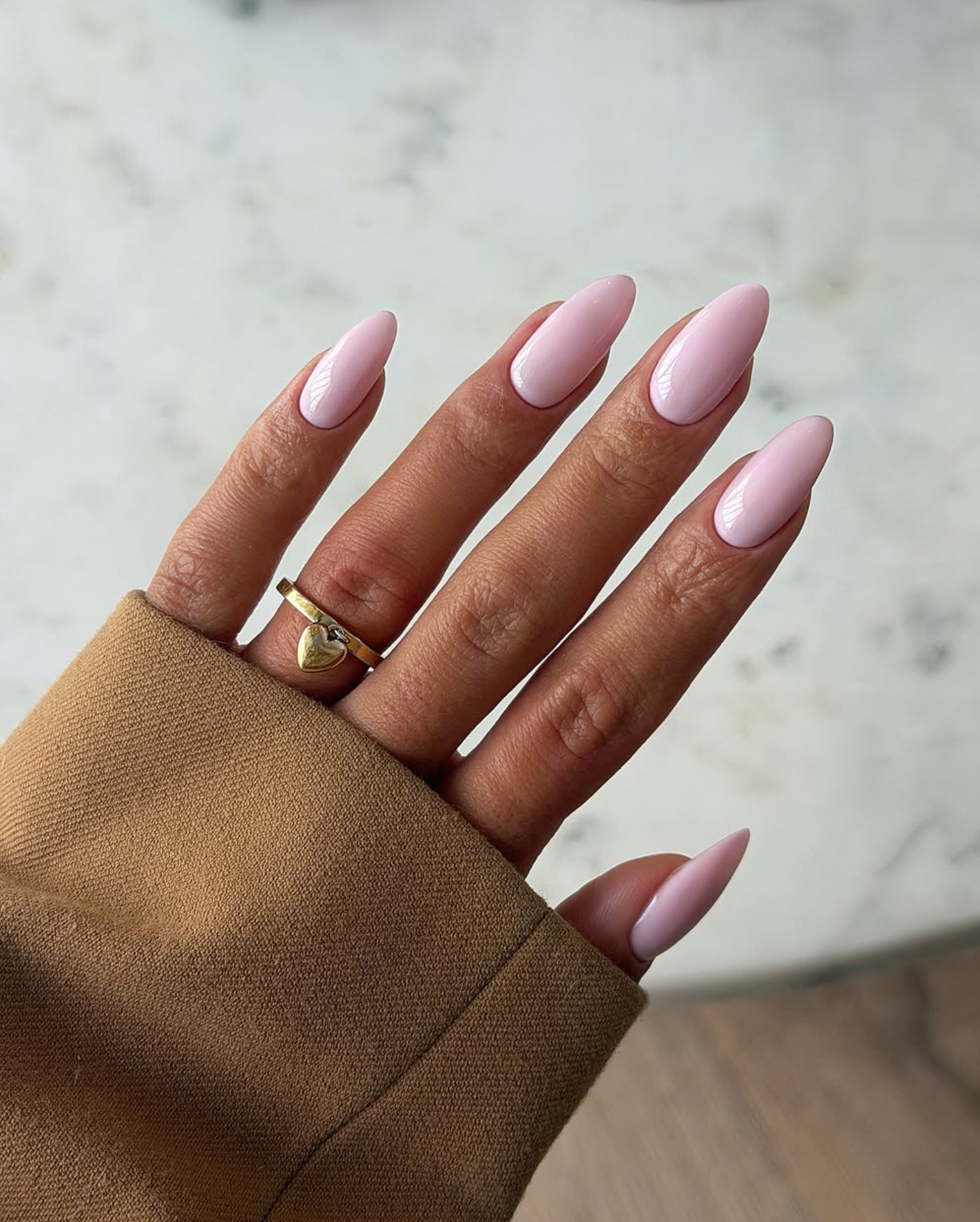 A petal pink manicure by Stephanie Holland