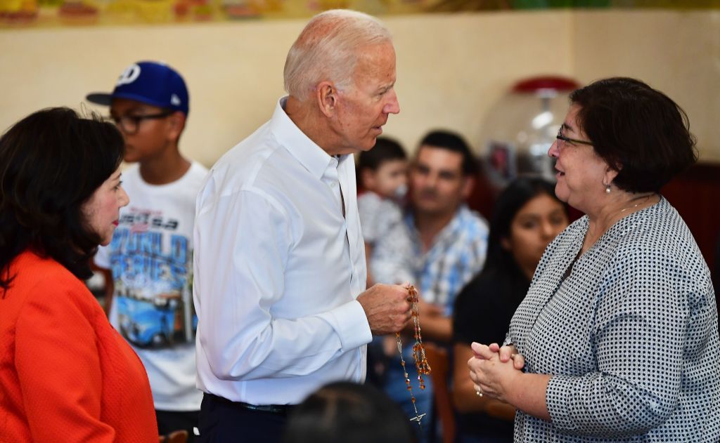 Biden holds a rosary