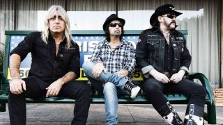 Motorhead sitting on a park bench in 2013