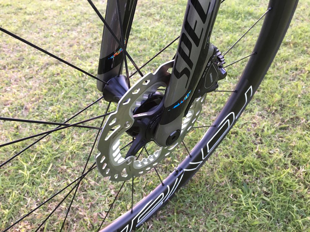 The front disc brake and the thru-axel give the bike a different appearance