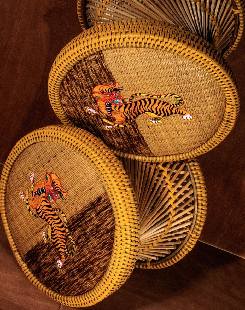 Baskets wit woven motifs depicting tigers