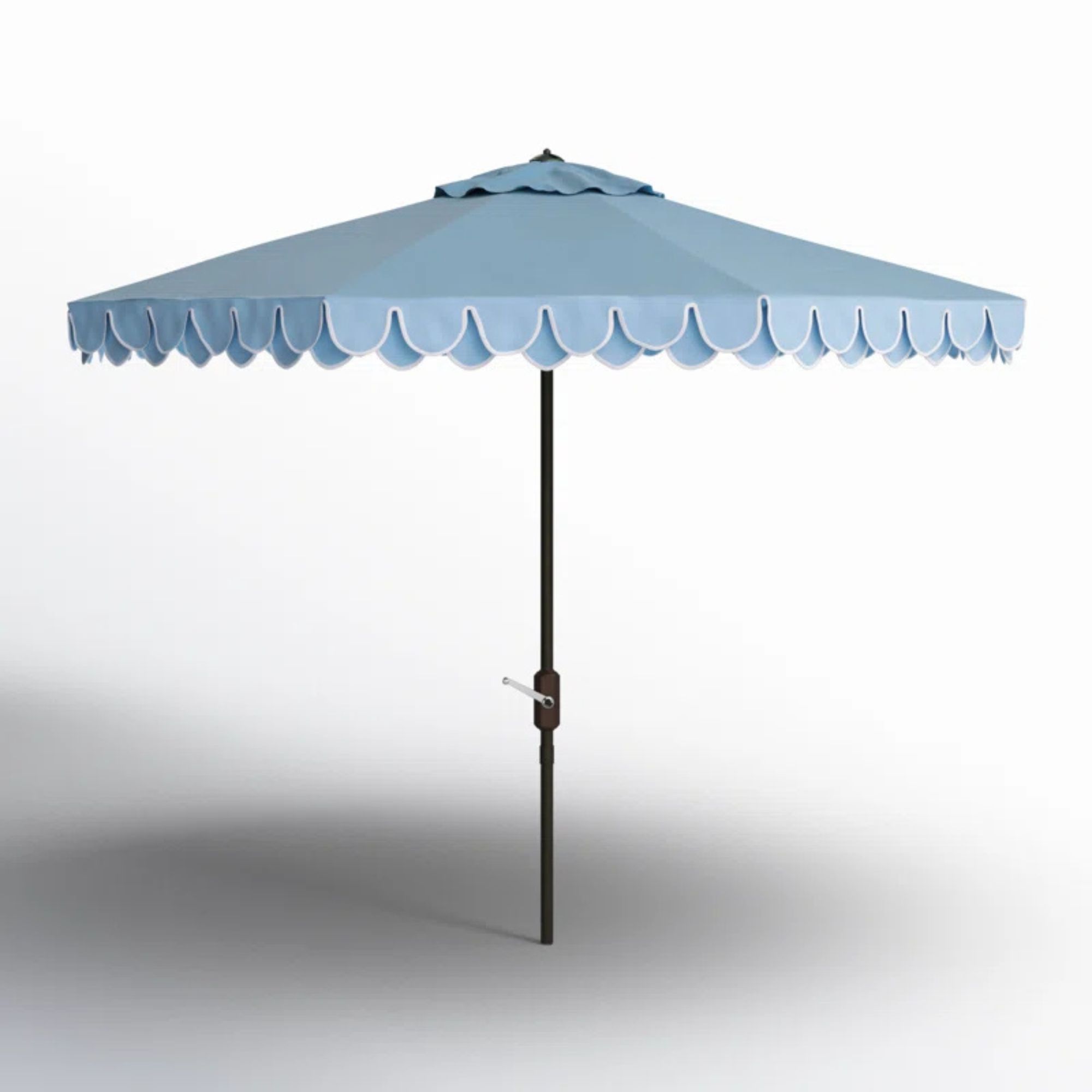Pale blue parasol with white scalloped edges